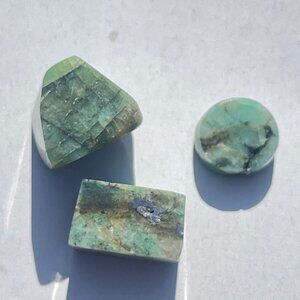 28.50cts Emerald Parcel - Custom Cut in display case